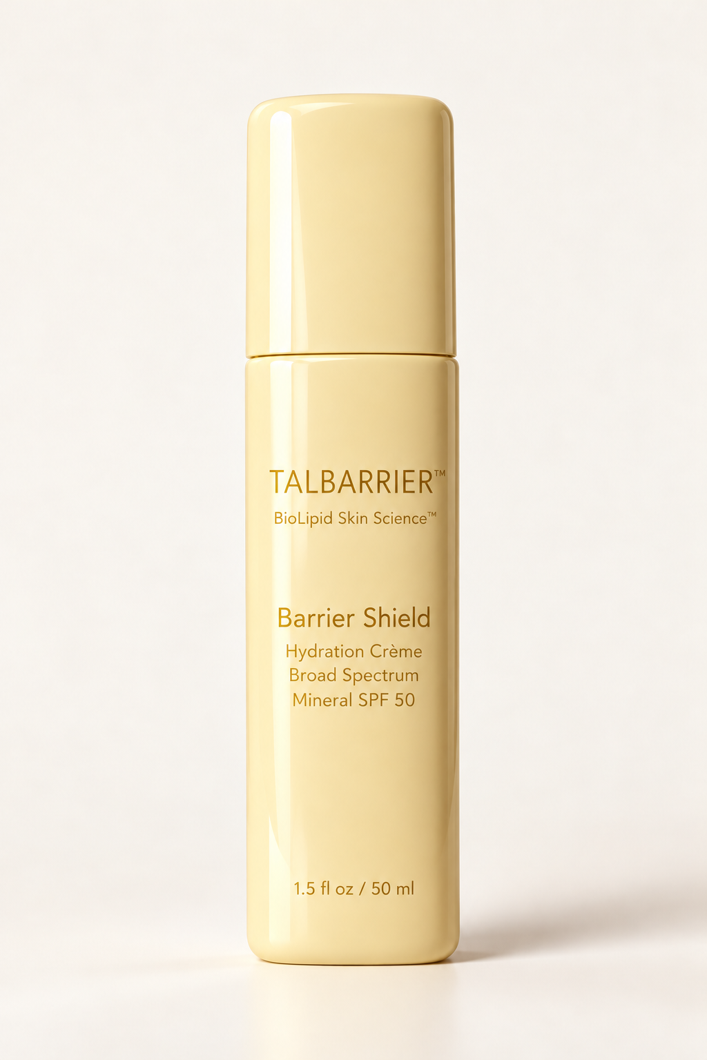 Pale yellow glass bottle of Talbarrier luxury barrier repair skincare hydration cream SPF 50 mineral sunscreen for sensitive skin